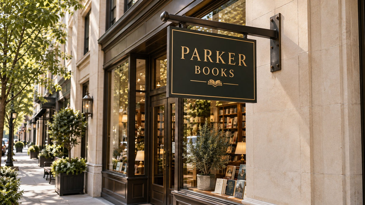 Premium PARKER BOOKS projecting blade sign on a downtown bookstore facade