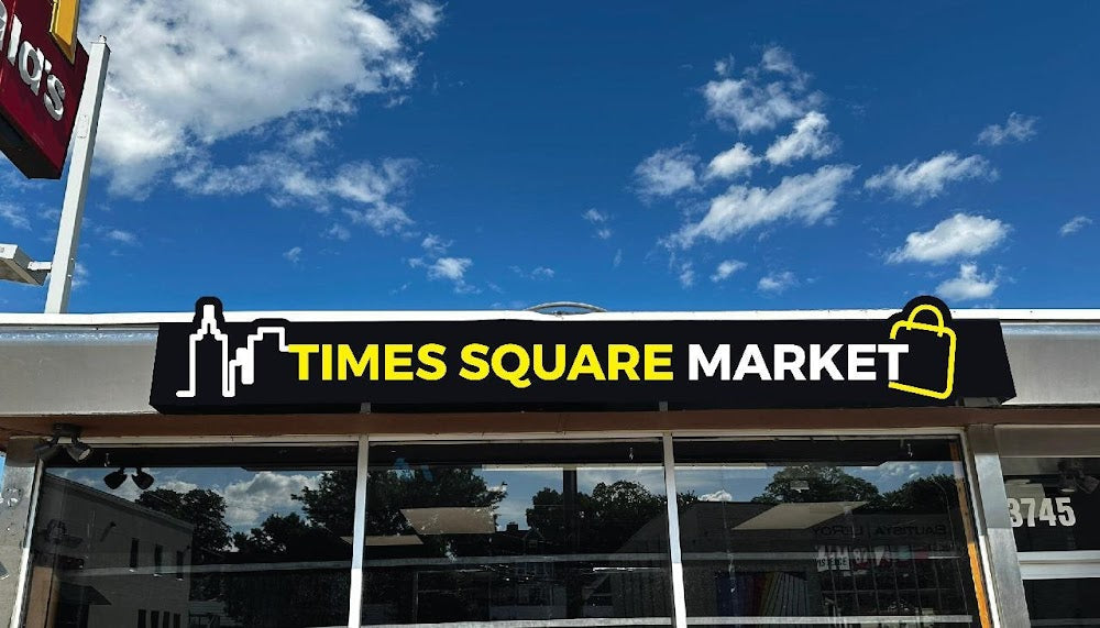Times Square Market storefront channel-letter sign mounted above a retail entrance